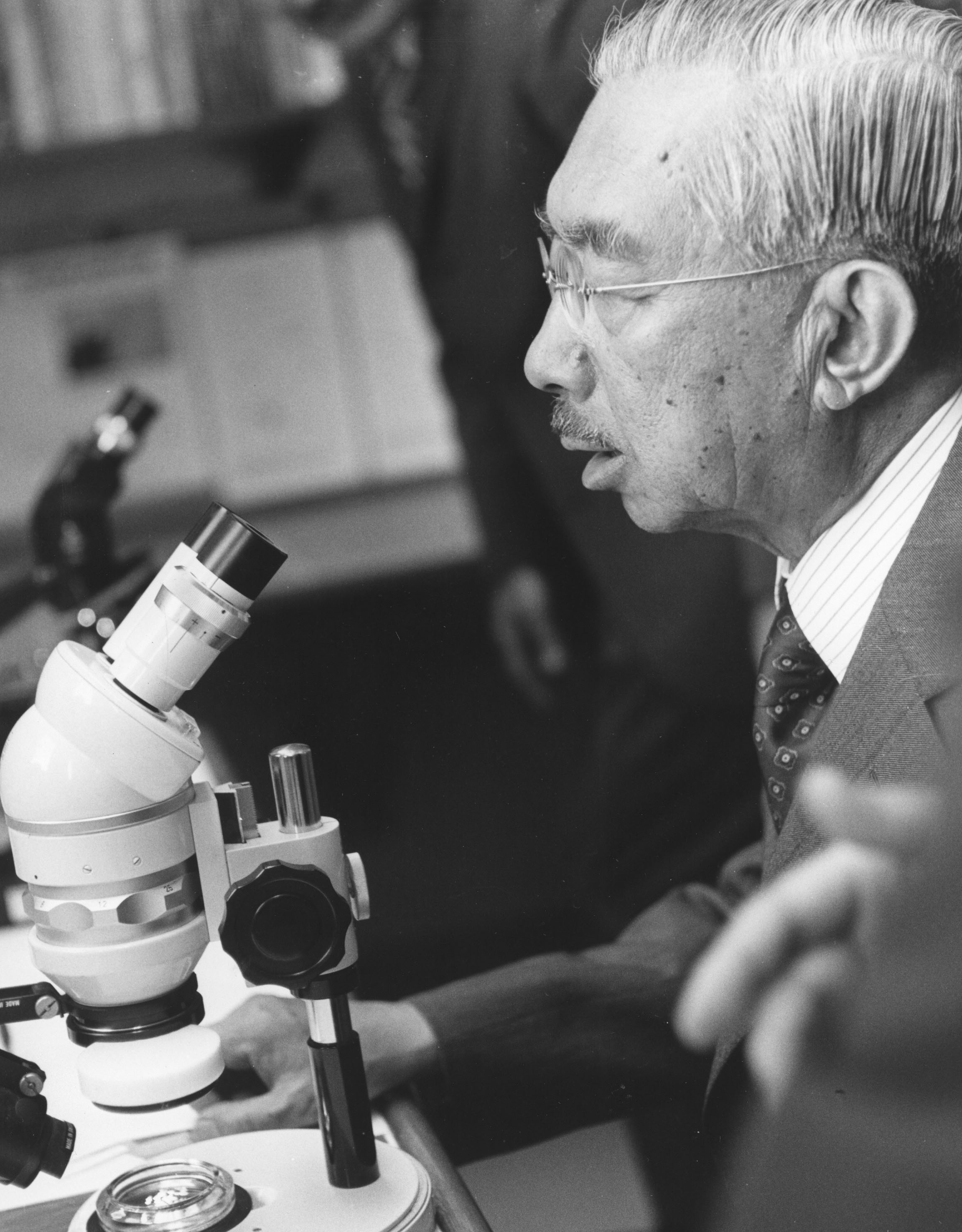 Hirohito at microscope